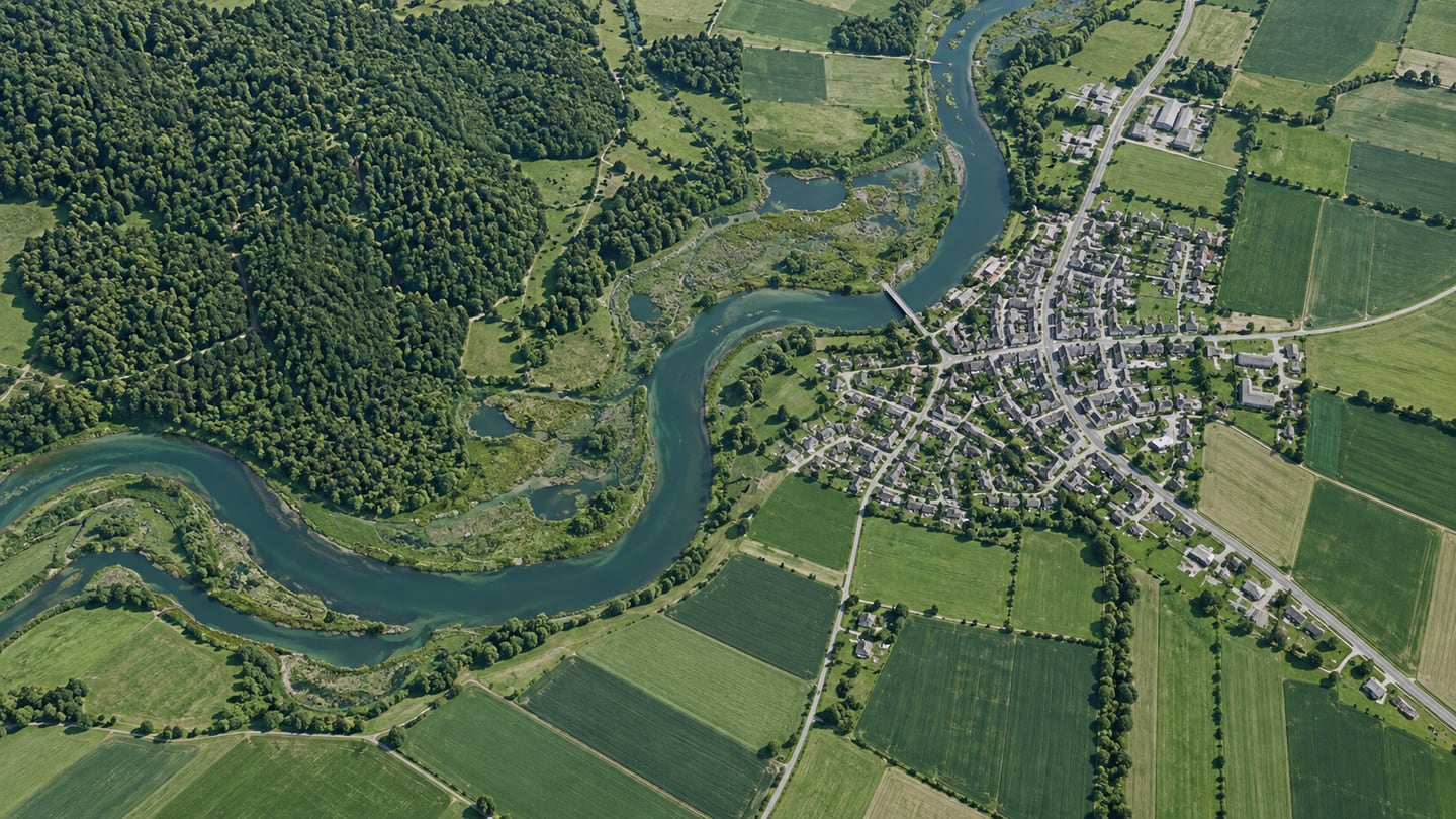 Illustrated aerial landscape showing fields, woodland, water and a town