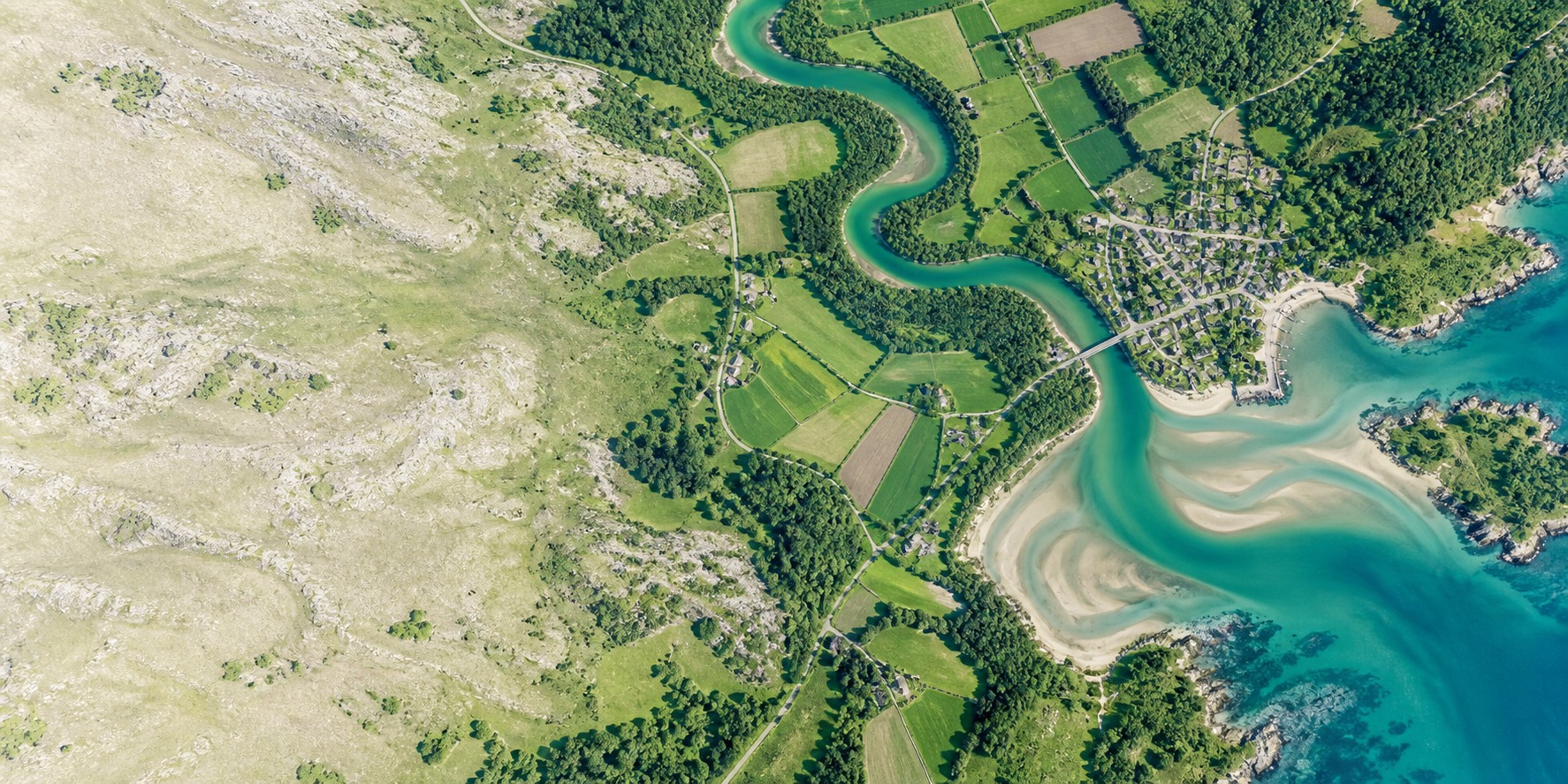 Illustrated aerial landscape with a river, fields and coastline
